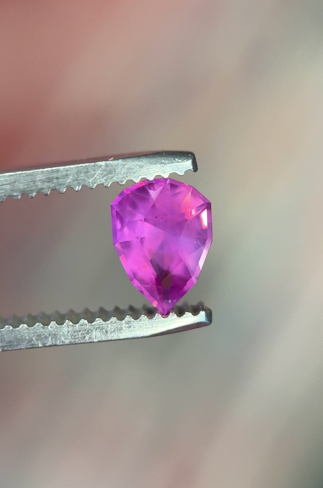 1.24CT Sapphire: Opalescent Hot Purplish Pink Precision Geometric Pear Modified Brilliant Cut