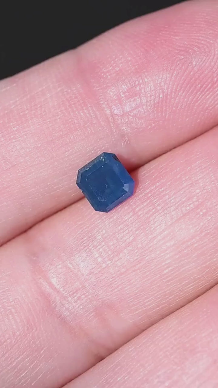 Explore the scale and distinctive color of this 1.08ct untreated denim blue sapphire from Gombe, Nigeria. Its squared octagonal step cut and opalescent blue appearance make it a compelling choice for bespoke engagement rings and contemporary gemstone jewelry.