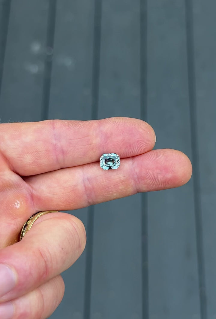 Video of 2.53 carat color change sapphire shifting from purplish-grey to steely blue-green under different lighting, precision radiant cut from Sakaraha, Madagascar.