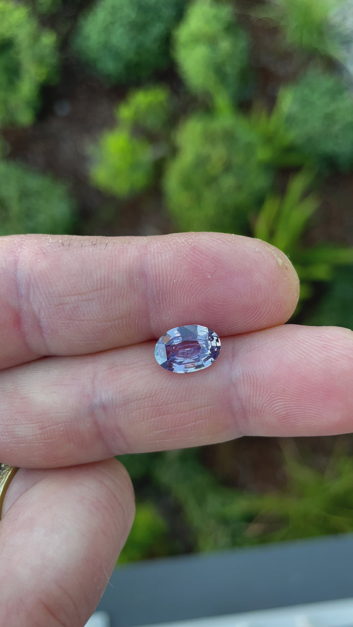 Experience the elegance of a natural untreated purple sapphire weighing 2.56 carats. Featuring a mix brilliant oval cut, this Sri Lankan gem measures 10.06 x 7.14 x 4.10 mm, showcasing vibrant brilliance and exceptional craftsmanship.