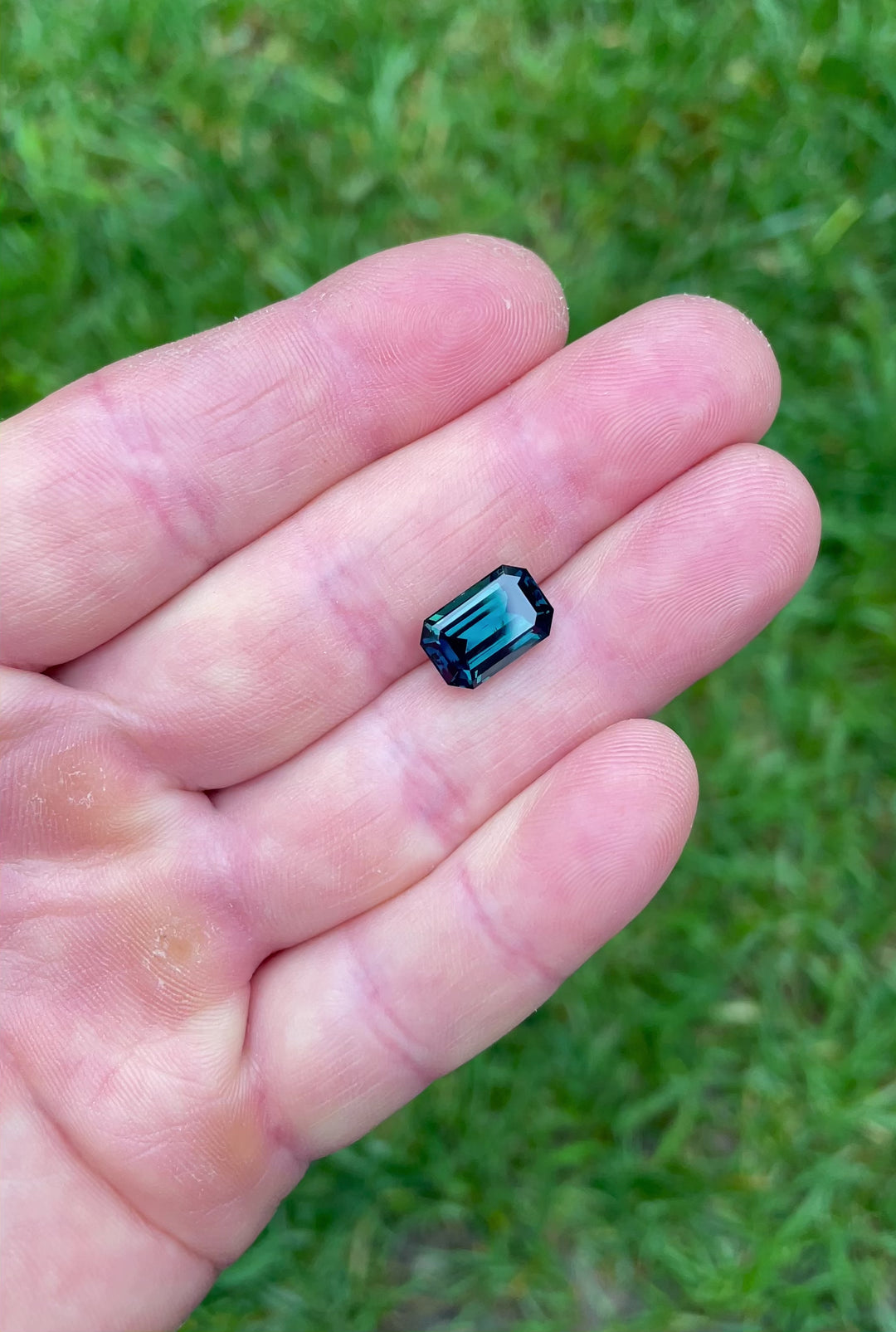 High-resolution video capturing the sparkle and depth of a natural 5.85 carat sapphire in octagonal step cut, from Gombe, Nigeria.