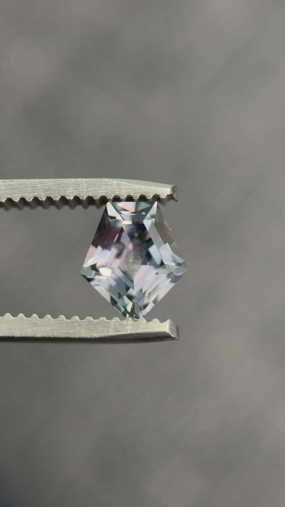 360-degree video of 1.50 carat color-change sapphire from Montana in shield step cut, shifting from teal to purple