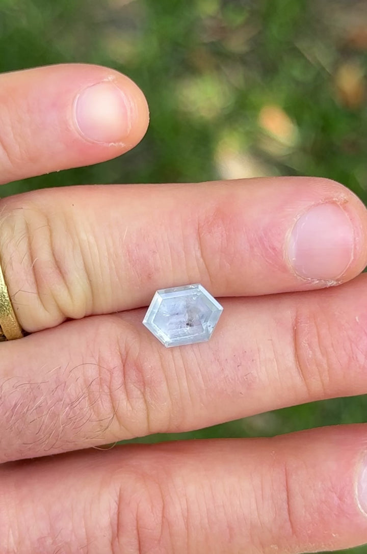 Rotating video of untreated Montana sapphire with hexagon step cut, revealing its unique powdered blue and grayish lavender color play
