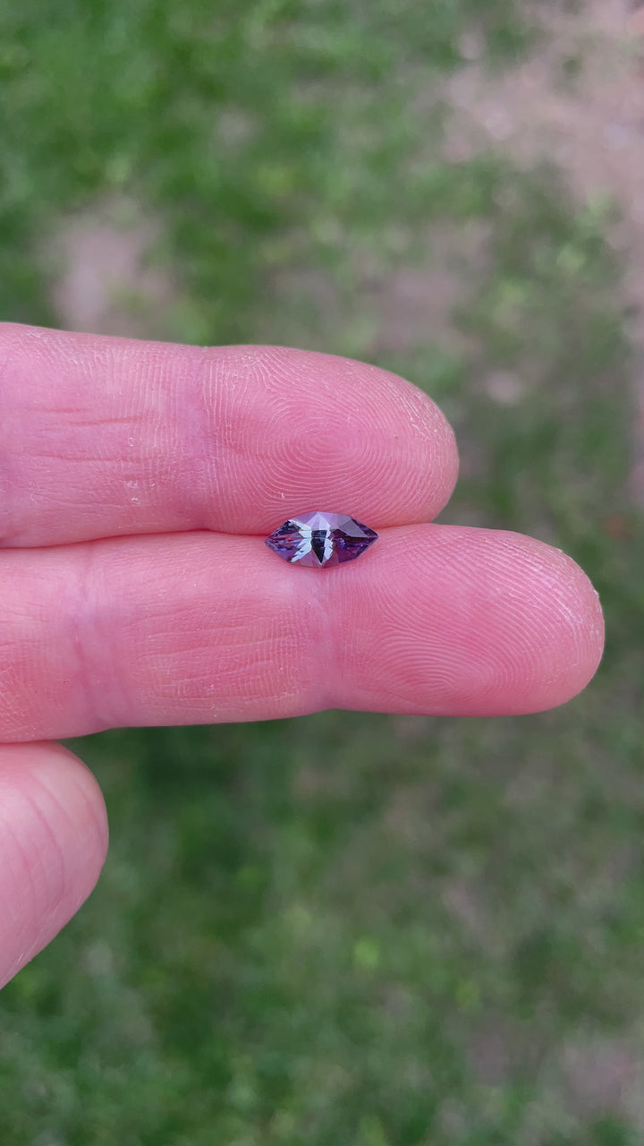 Rotating video of a 1.17ct marquise Tanzanite, highlighting its untreated violet and purple color shifts with exceptional clarity and cut.
