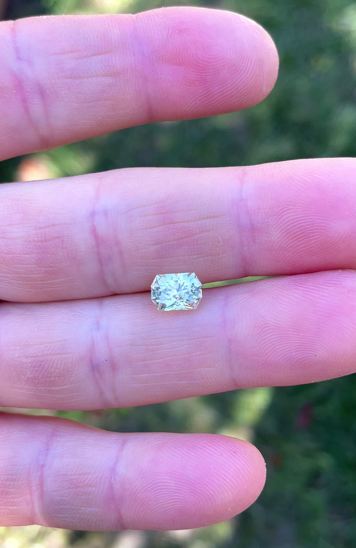 Spinning view of a 2.04-carat yellow-green sapphire from Malawi, showcasing the unique brilliance of Randy’s Cut Corner elongated octagon cut.