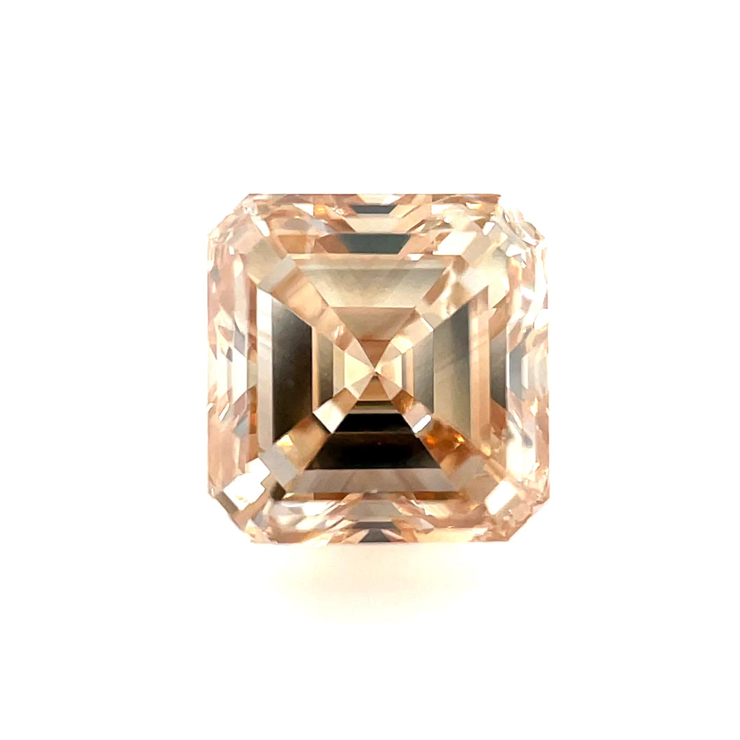 A close-up rotating video of a 1.01-carat Asscher cut champagne fancy brown diamond, highlighting its clarity, rich color, and precision-cut step facets.