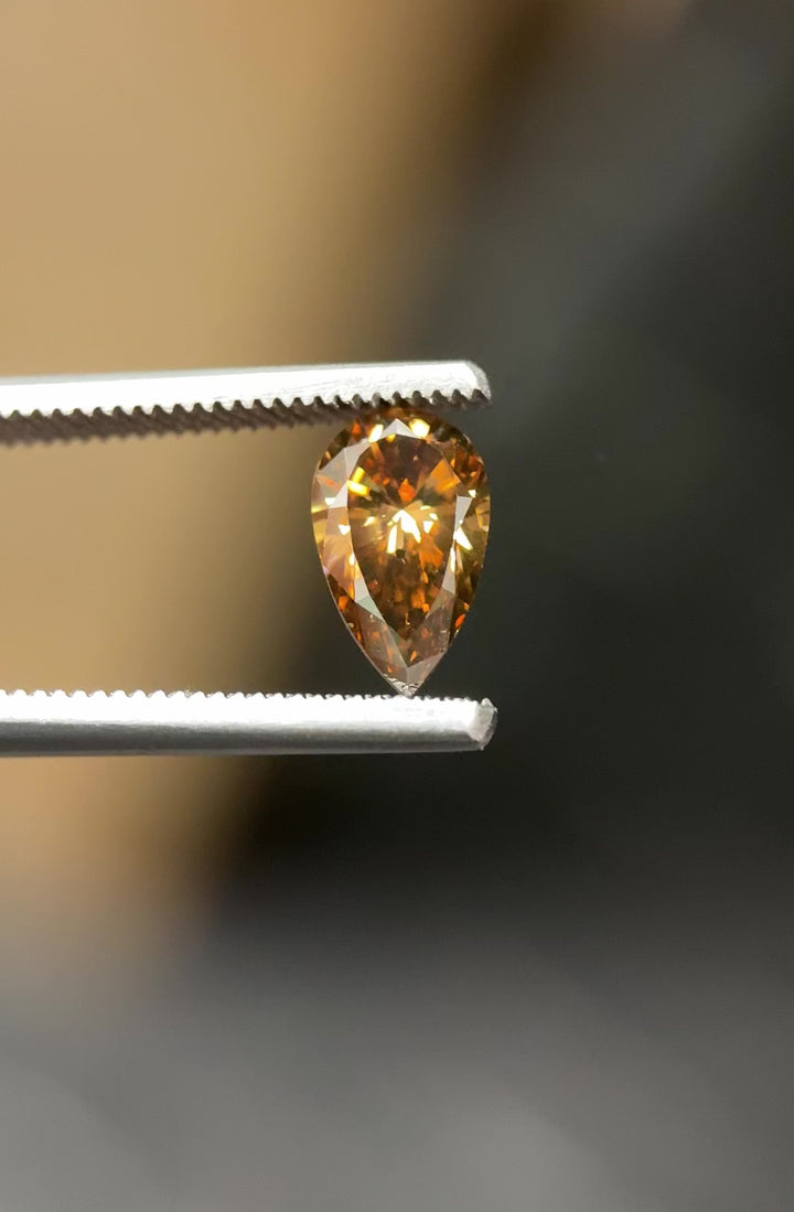 1.65CT Diamond: Fancy Orange Brown Elongated Pear Brilliant With Museum Quality Bi Color Fluorescence