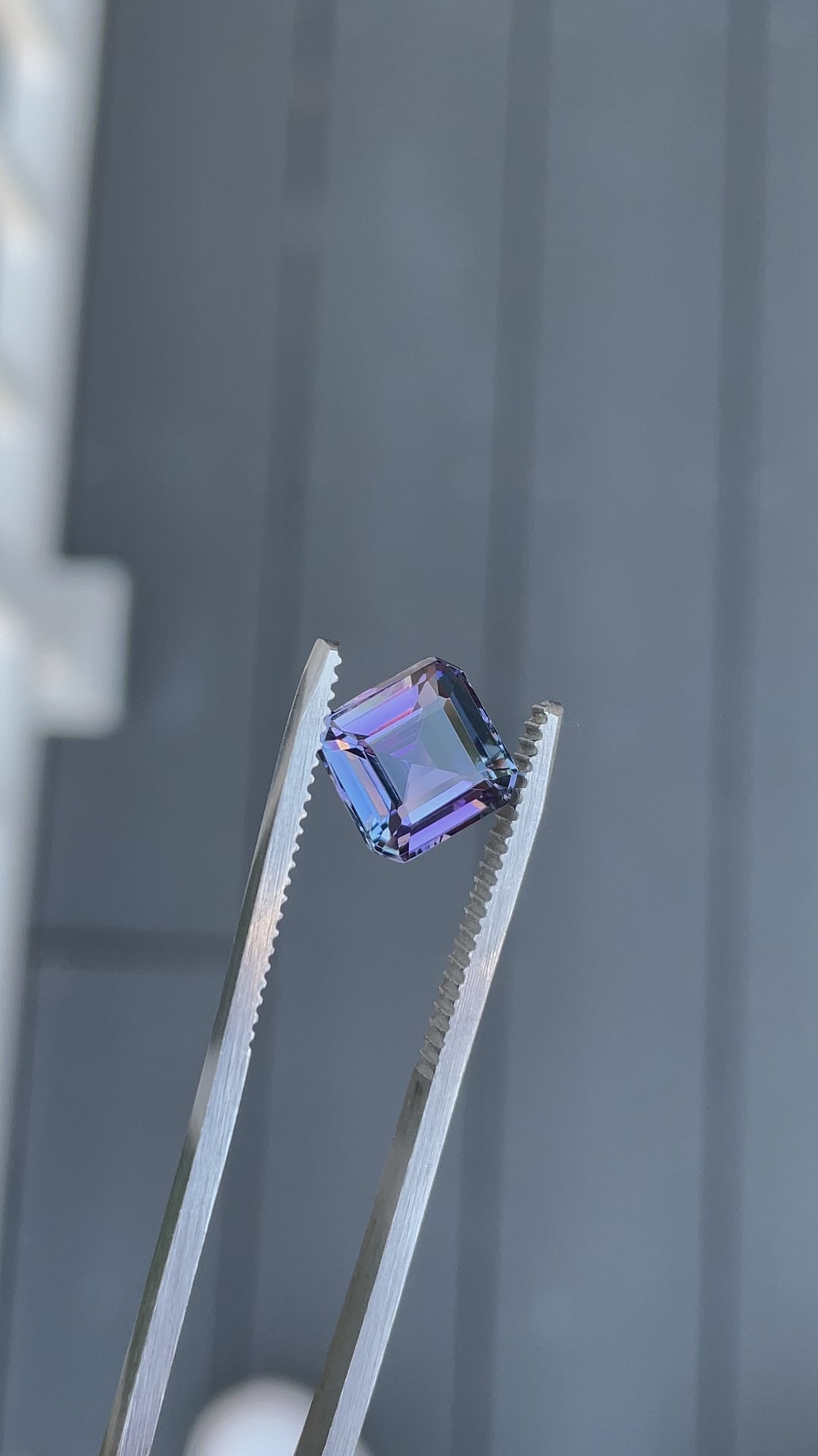 Video showcasing full rotation of a 3.51-carat Tanzanite with step cut Asscher facets and mermaid 