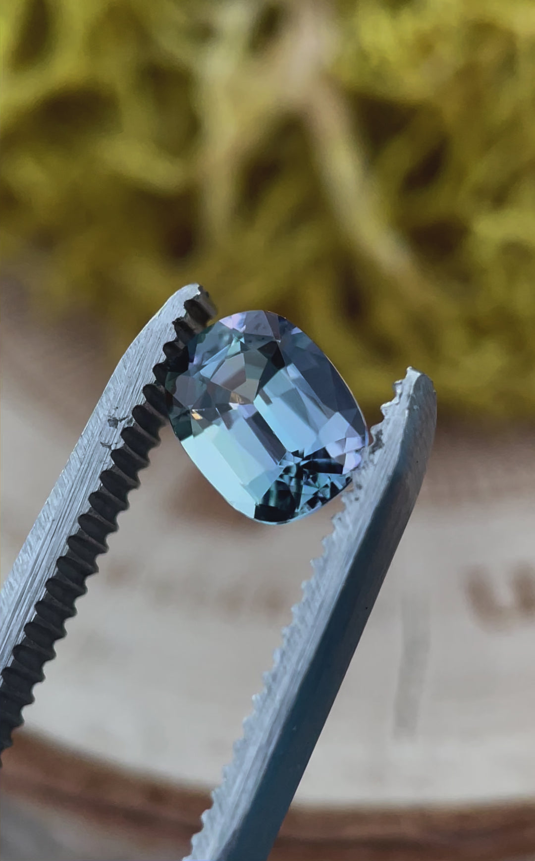 Rotating view of a 1.36-carat Tanzanite, revealing its stunning color shift from teal to violet. The modified cushion cut enhances the gem’s depth and fire, making it a perfect choice for fine jewelry.
