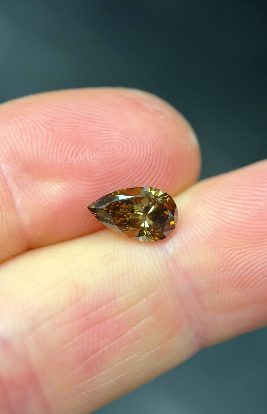 1.65CT Diamond: Fancy Orange Brown Elongated Pear Brilliant With Museum Quality Bi Color Fluorescence