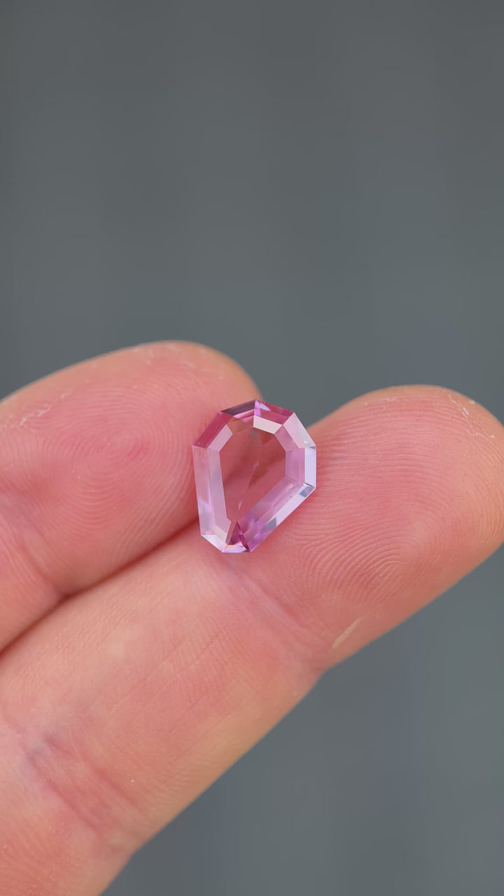 3.87 Spinel: Vivid Pink Custom Shield Step Cut in hand Video