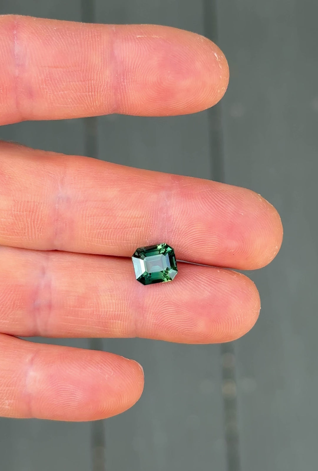 Hand Video of a 4.02CT Madagascar Teal Sapphire – Precision Emerald Cut