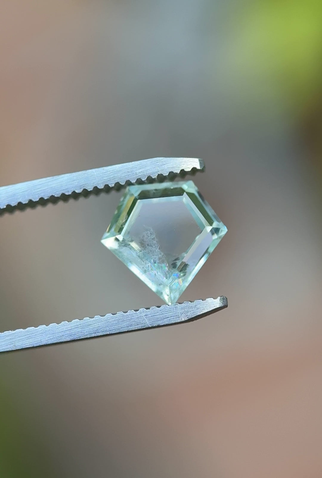 Close-up video showcasing brilliance and color play in 2.81ct mint green sapphire from El Dorado Bar, Montana