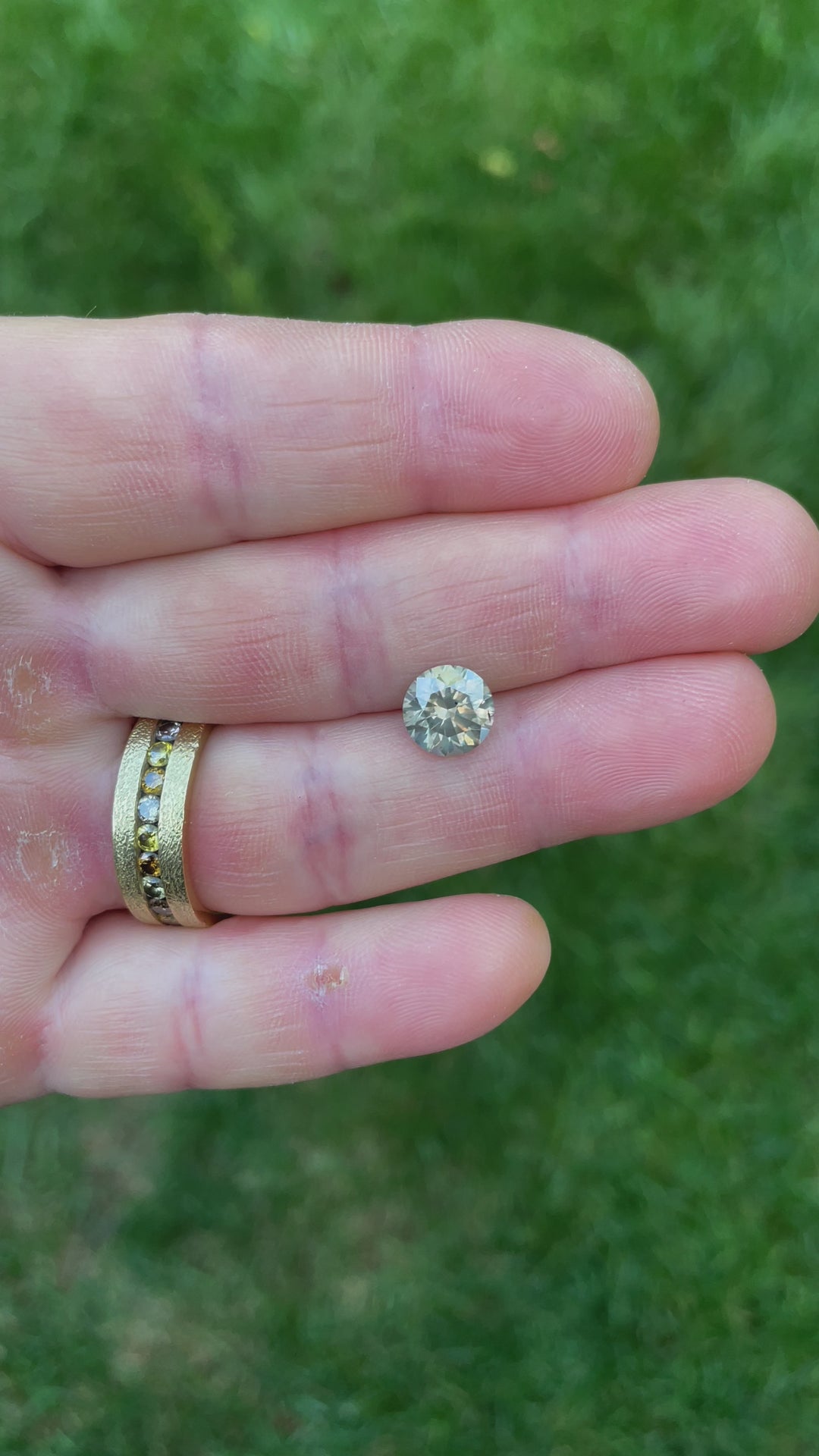 2.53-carat Fancy Gray Diamond in Round Brilliant Cut from South Africa, showcased under natural lighting to highlight its brilliance and clarity.