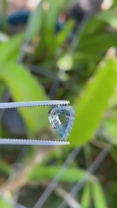 Video showcasing Color Change Sapphire, Gray to Violet, Modified Geometric Step Cut Portrait Pear, 2.51 Carats, 10.13 x 8.82 x 3.17 mm, Originating from Sri Lanka, No Treatment, $3825.00 Price