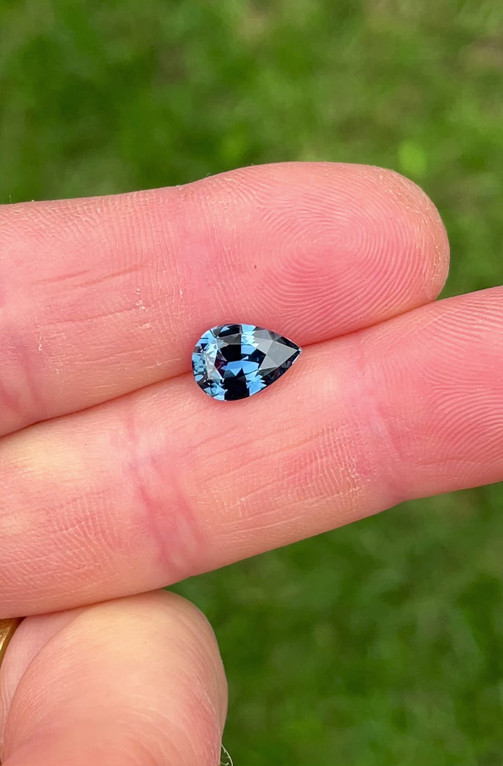 Video of 2.54ct pear brilliant cut sapphire from Madagascar with vivid teal and blue flashes captured under changing angles.