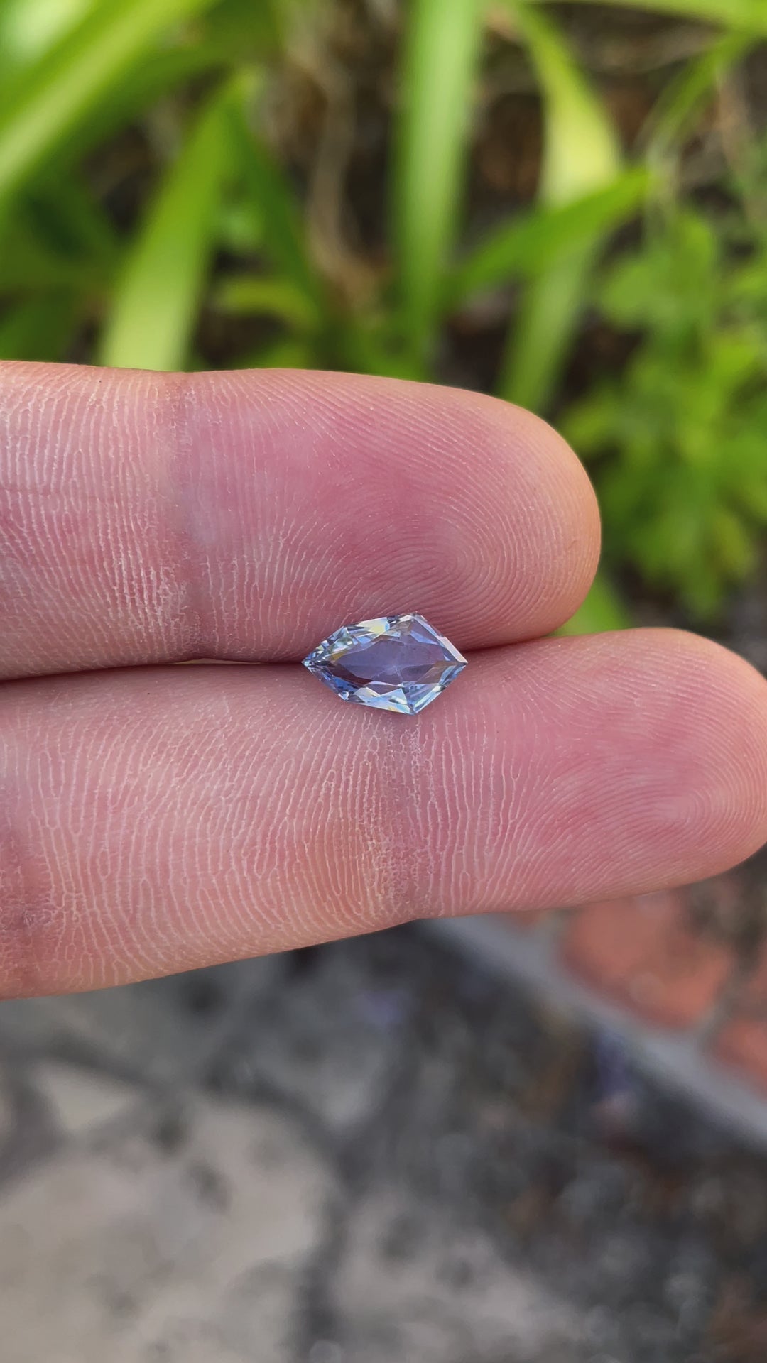 Detailed view of Light Ceylon Denim Blue Sapphire, Custom Mix Shield Cut, 1.66 Carats, 11.12 x 6.95 x 3.20 mm, Sri Lankan Origin, No Heat Treatment, Priced at $1328.00