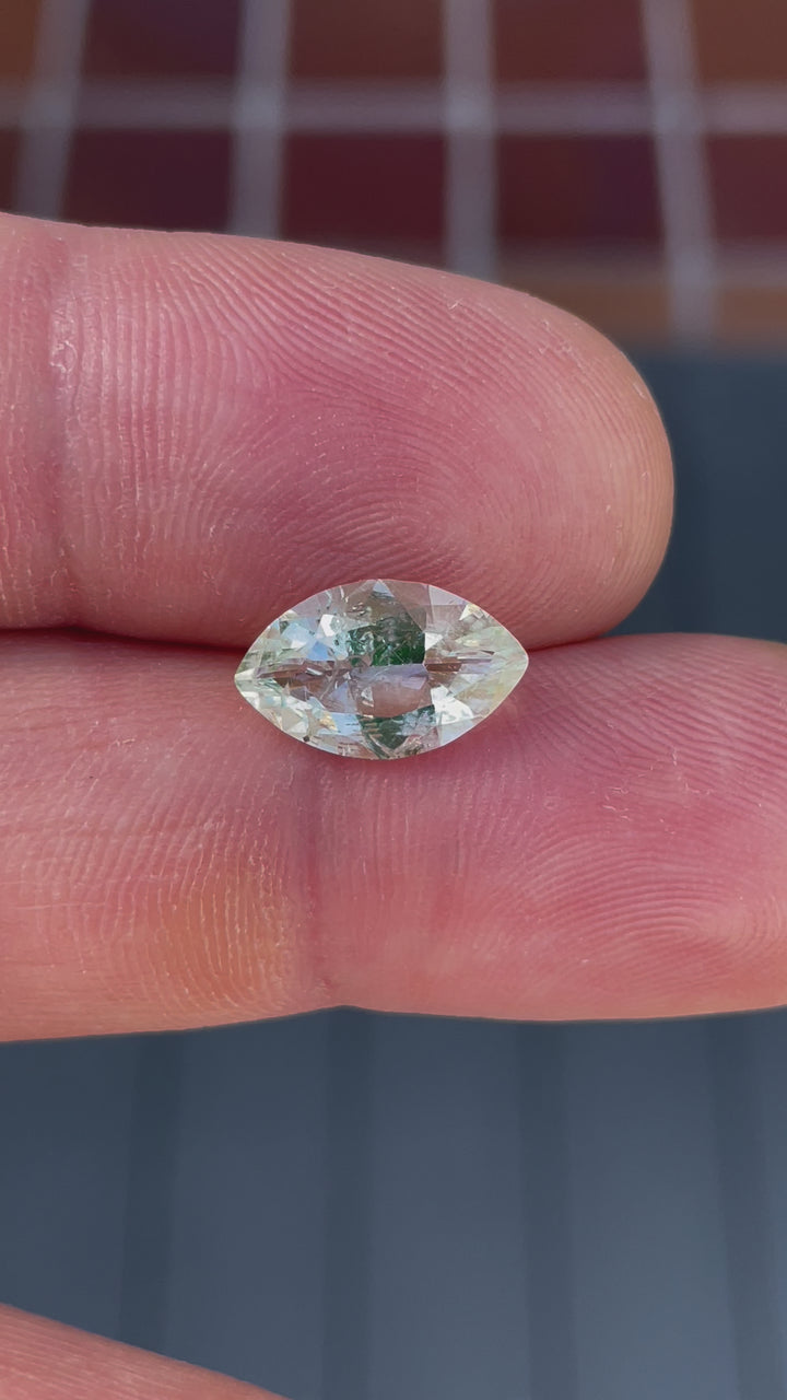 2.18CT Hyalite Opal: Colorless with Green and Blue Oval Brilliant Cut