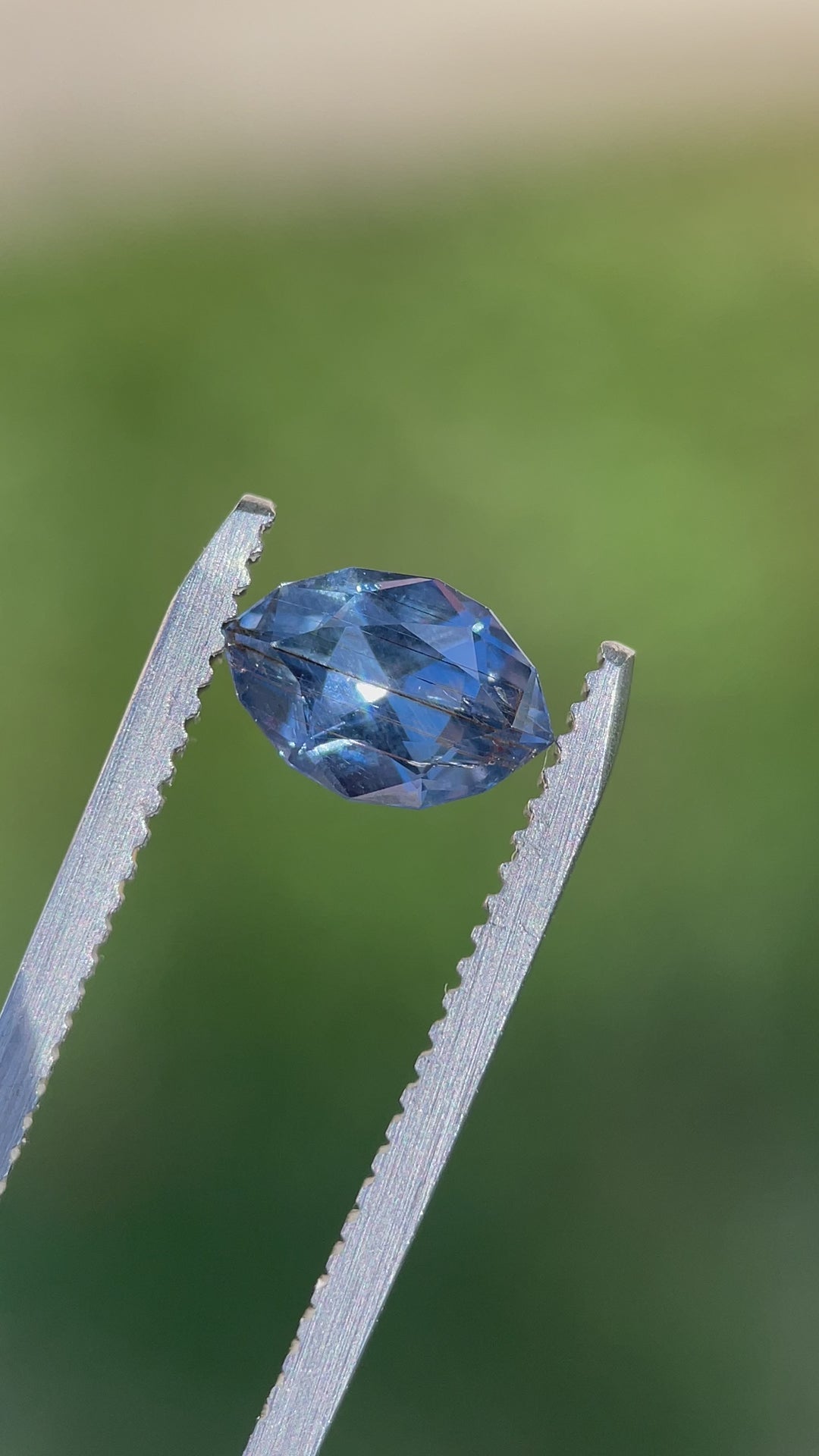 Video showcasing the 1.36 carat untreated sapphire in a marquise cut, capturing the dynamic blue and periwinkle color under natural light.