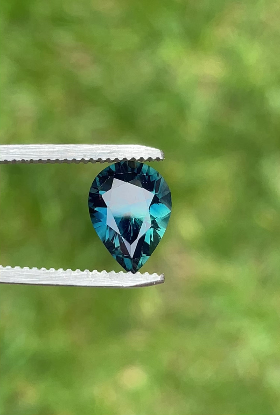 Rotating view of an untreated 4.20ct Nigerian sapphire, pear-shaped with vivid green-blue tones