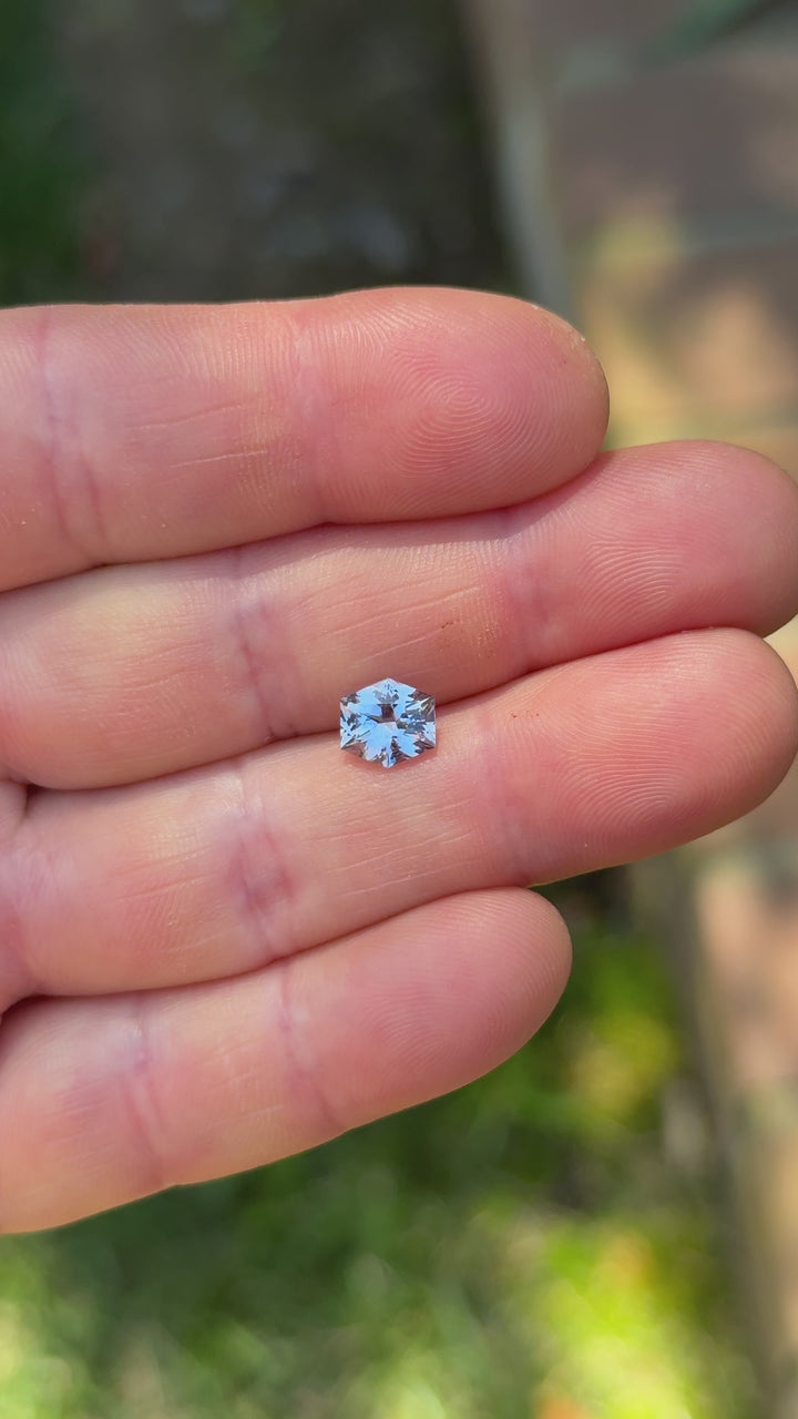 Close-up rotation of 1.60ct sapphire highlighting color play and crisp hexagonal facets from Sakaraha, Madagascar