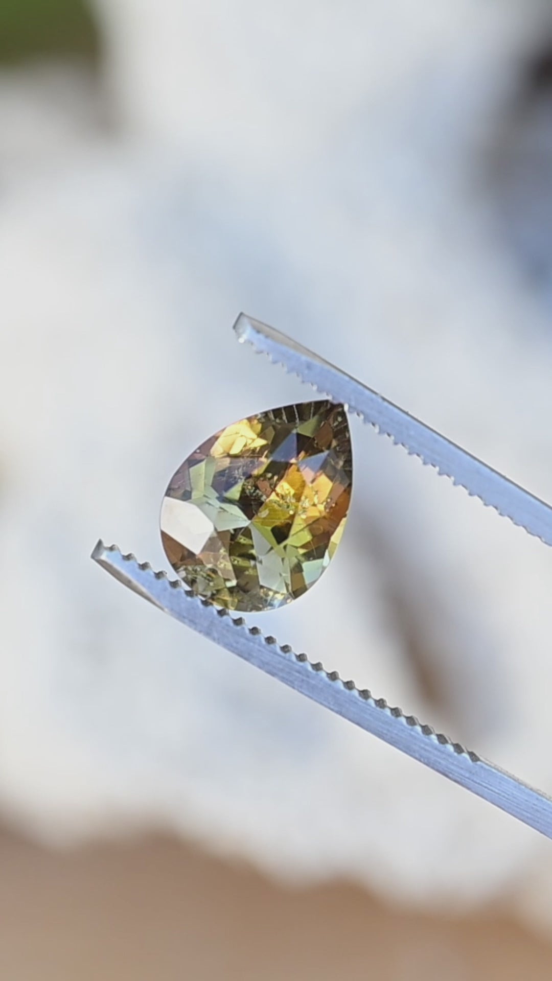 2.88CT Tanzanite: Yellow Green Blue Brilliant Pear Cut