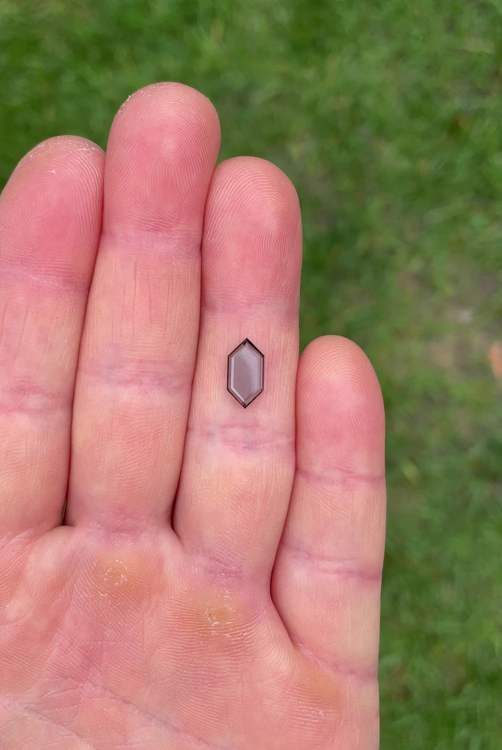 Close-up video showing the clarity and shape of a 1.43 carat untreated spinel in hexagonal cut