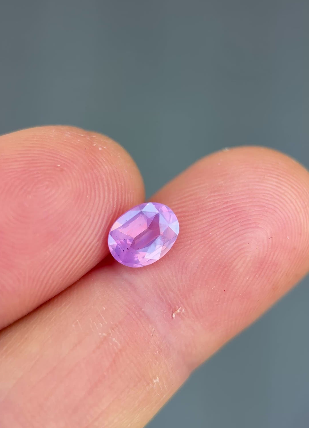 1.52CT Sapphire: Orangish Pink Opalescent Precision Oval Mixed Cut