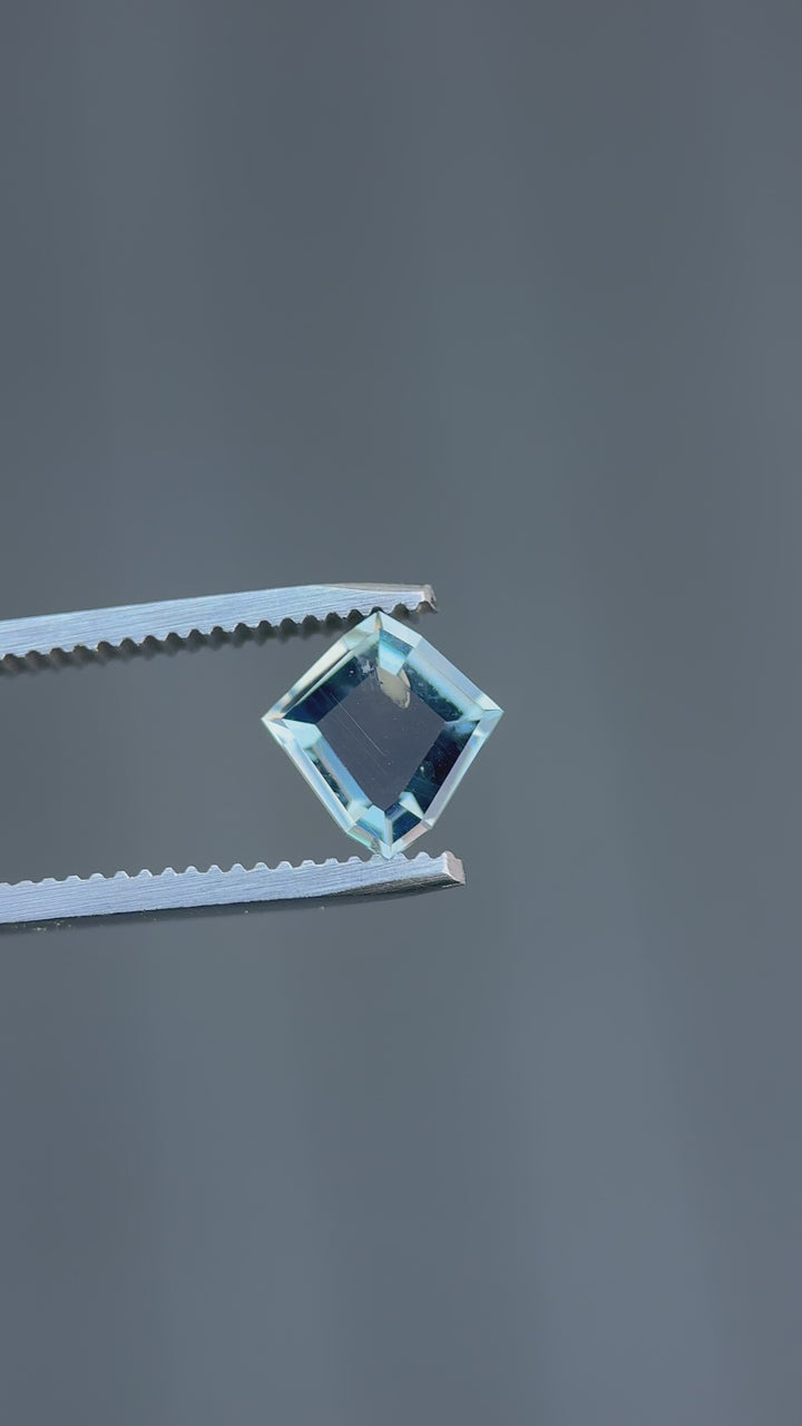 Video of Montana color change sapphire rotating to display transition from blue and lavender to vivid pink under different light sources.