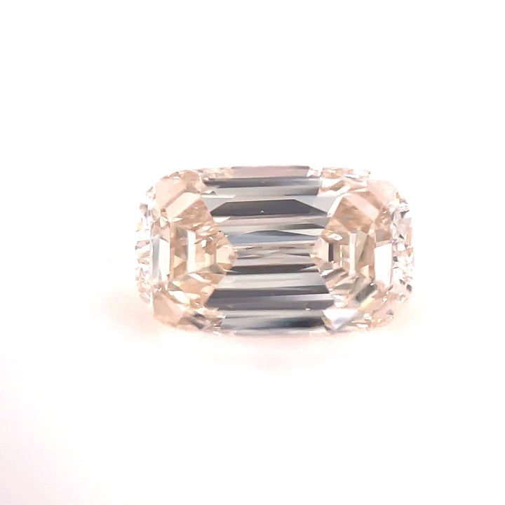 A high-resolution video capturing the intricate step-cut details of the 1.02-carat antique-style diamond, revealing its sophisticated brilliance from various angles.