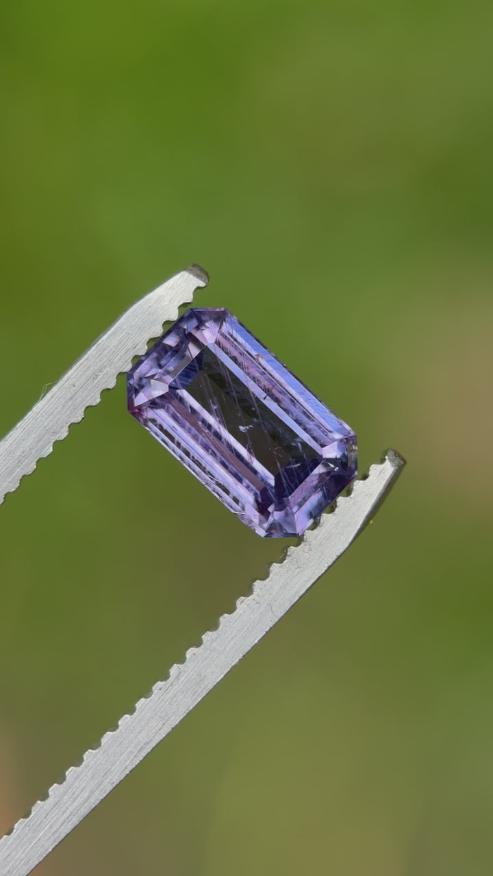 Rotating view of a 1.74 carat violet sapphire from Umba River, Tanzania, in elongated emerald cut with open culet