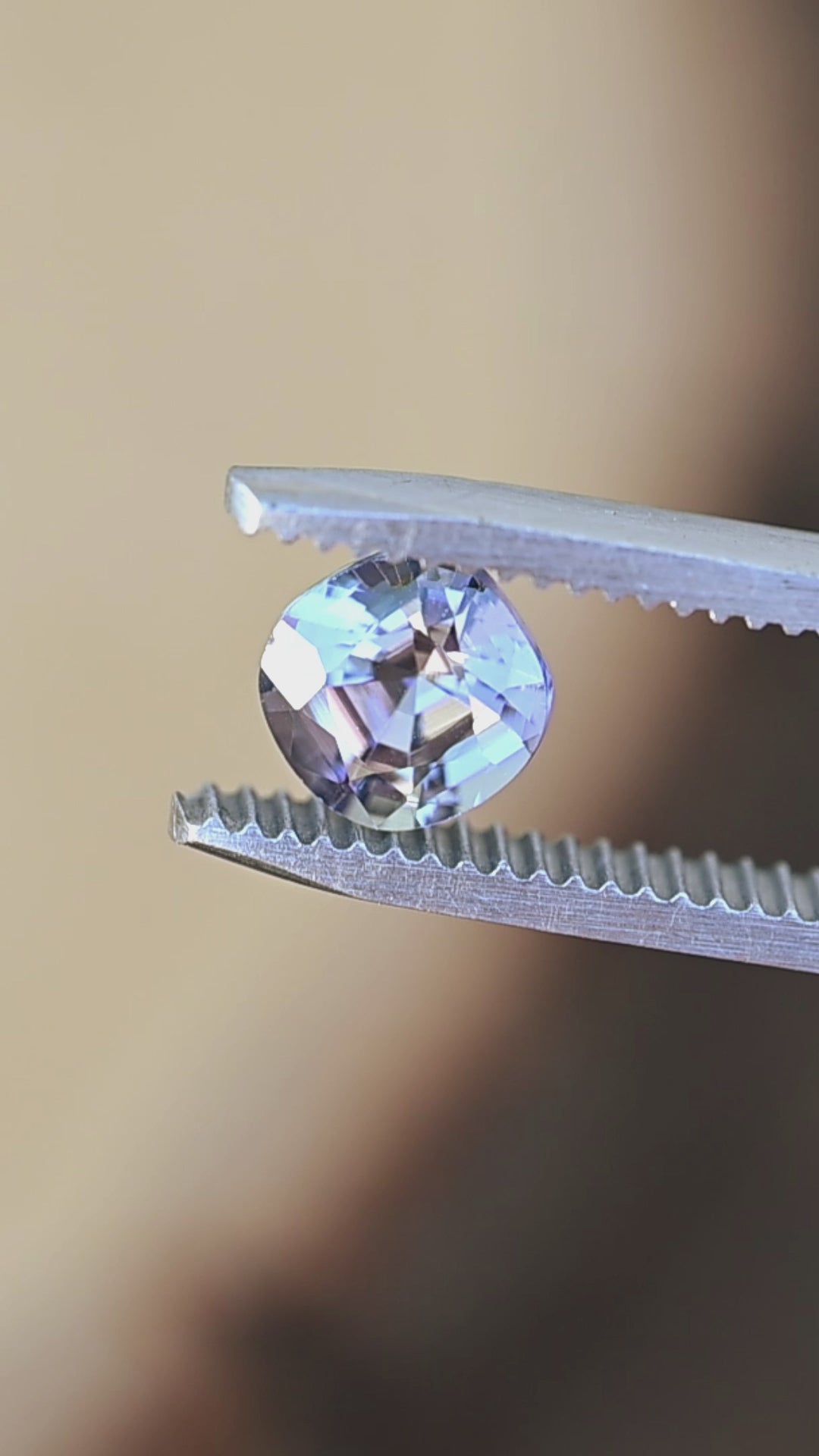Watch this natural 1.32 carat untreated Merelani Hills tanzanite rotate in natural light, revealing its beautiful transitions between blue, teal, green, and purple through its precision modified cushion cut.