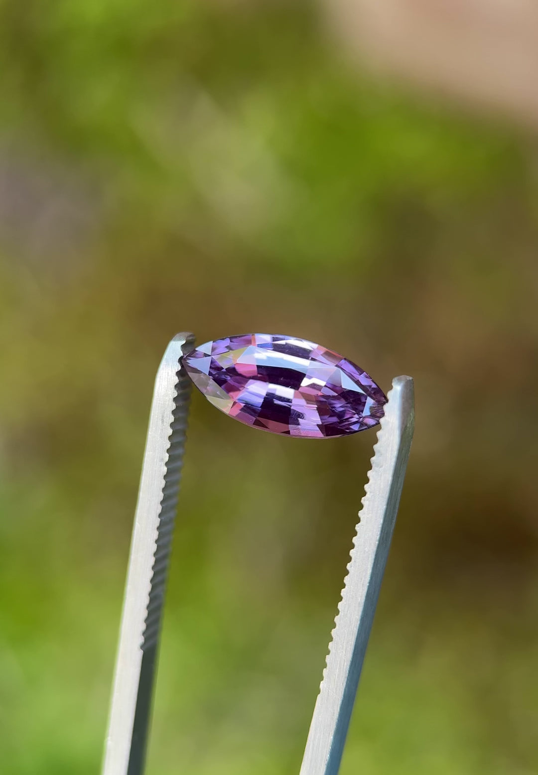 Rotating close-up of untreated 3.06CT sapphire from Sakaraha, Madagascar, highlighting precision marquise faceting and rich pink-purple brilliance.
