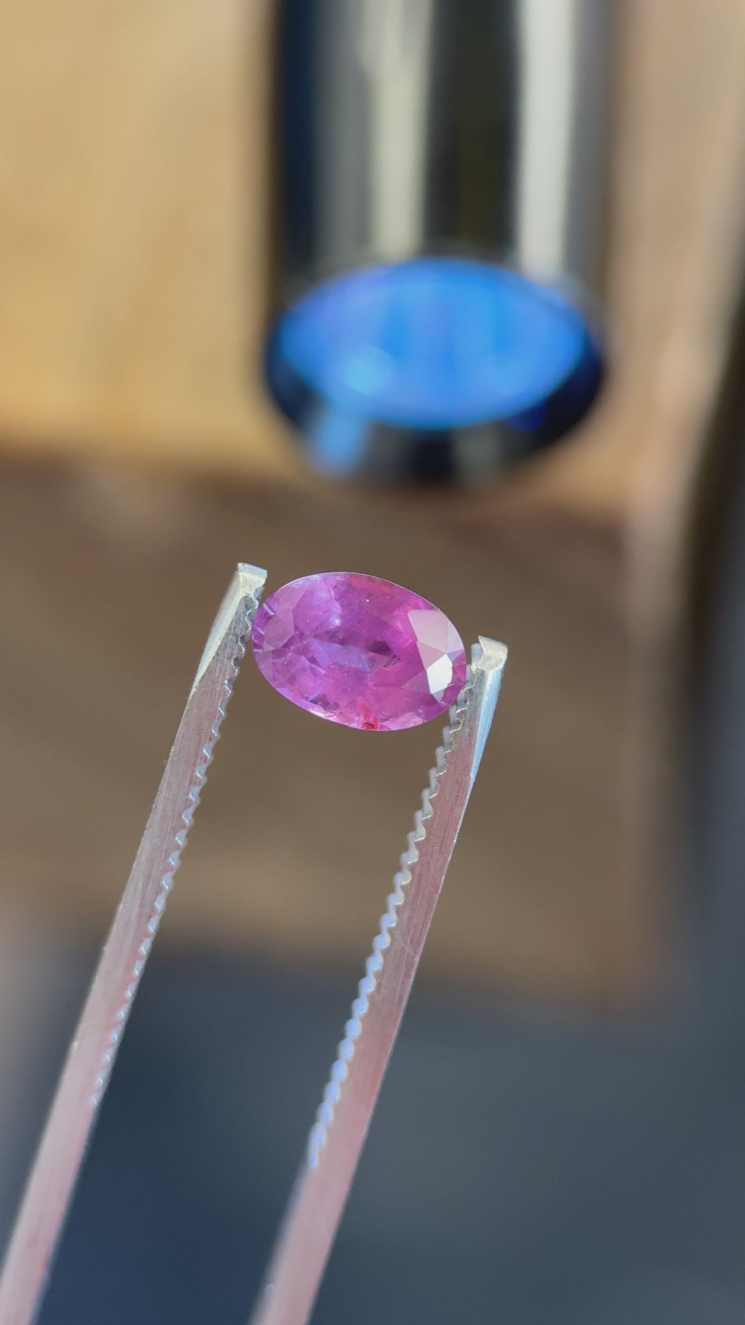 Indoor lighting video capturing the transparency, brilliance, and internal inclusions of a natural Umba sapphire.
