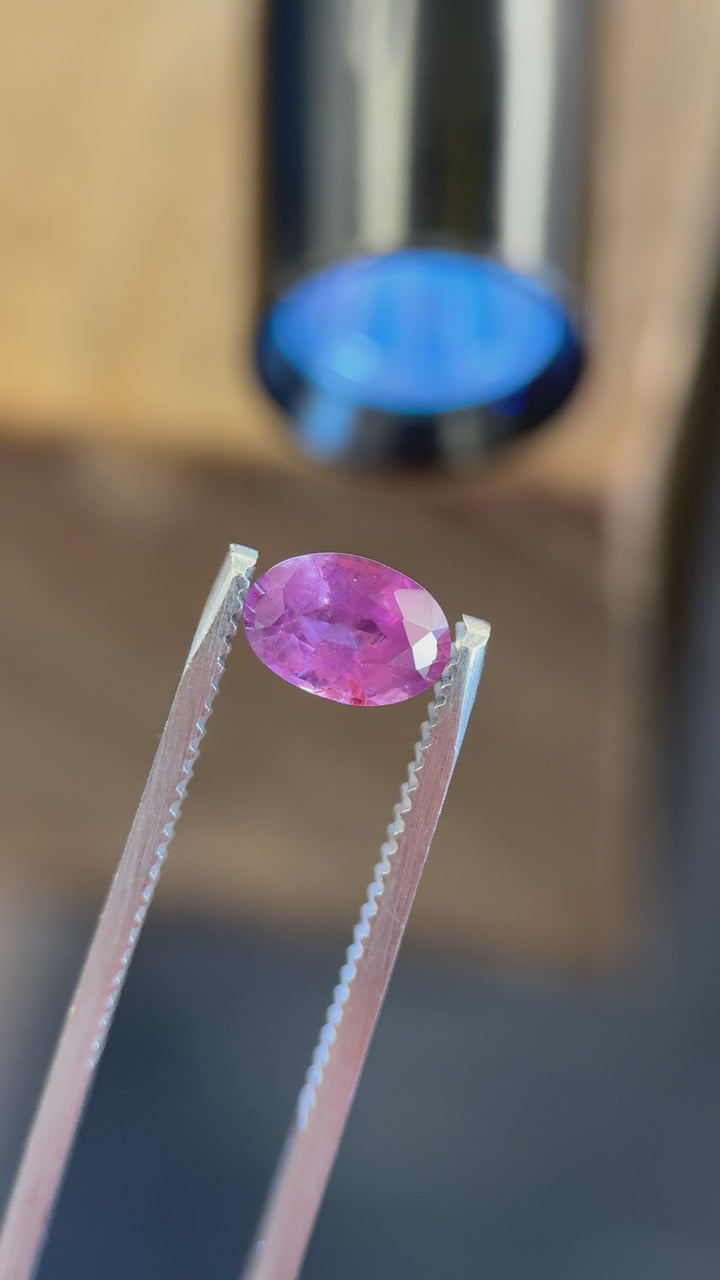 Indoor lighting video capturing the transparency, brilliance, and internal inclusions of a natural Umba sapphire.