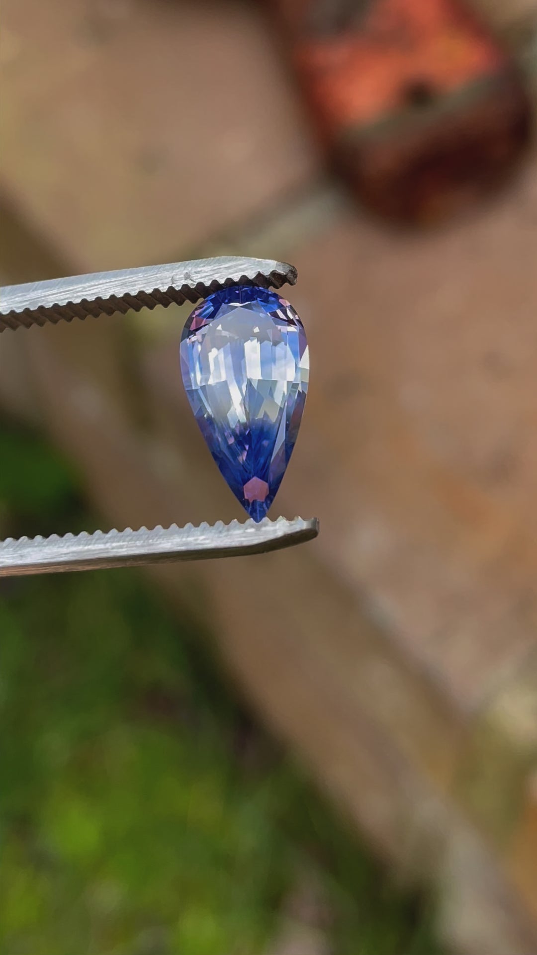 A 360-degree video showcasing the vibrant blue and yellow hues of a 3.14-carat pear-shaped parti sapphire. The untreated gemstone is ethically sourced from Sri Lanka.