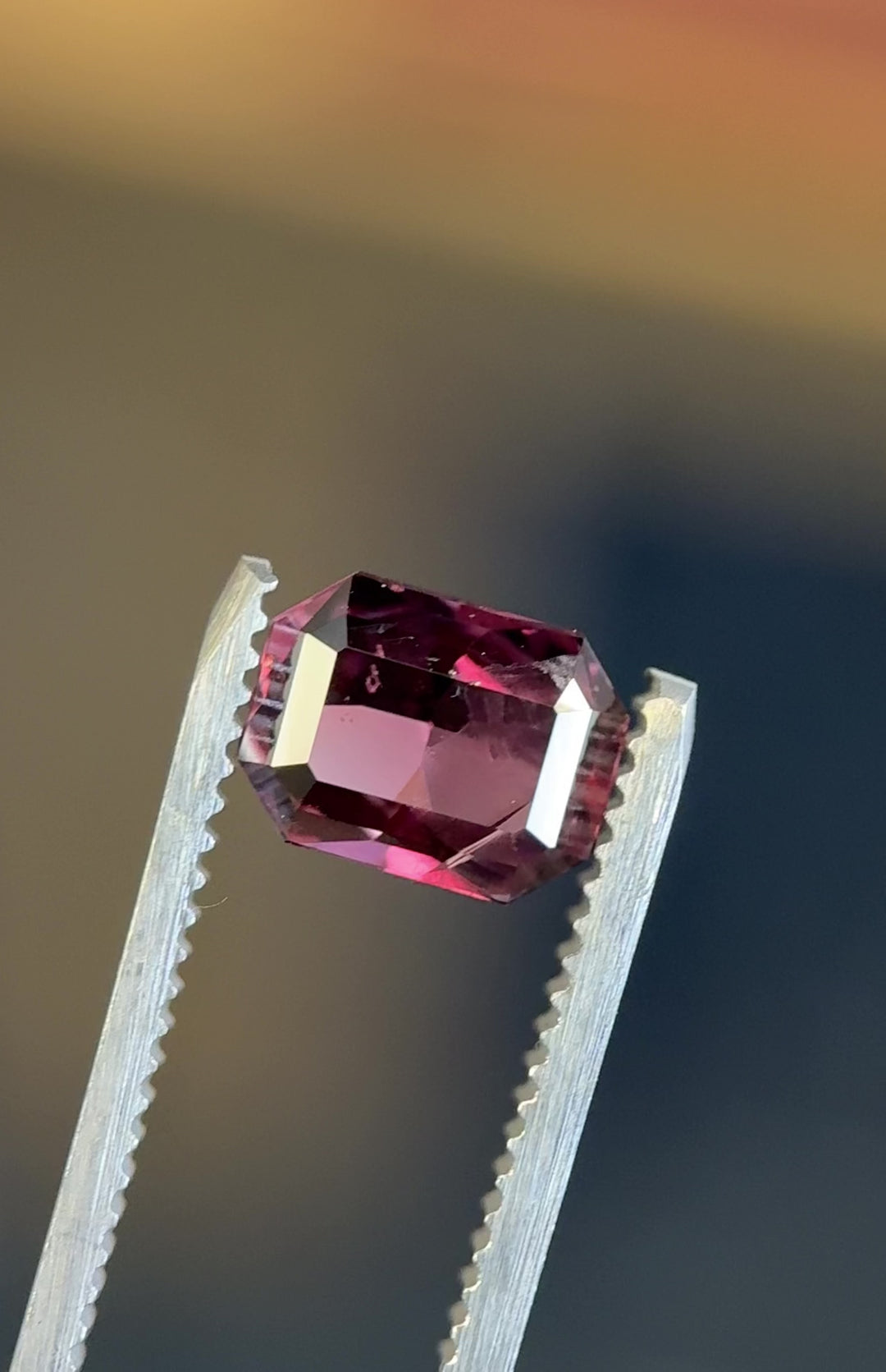 1.77CT Sapphire: Red, Brown, and Purple Modified Emerald Cut