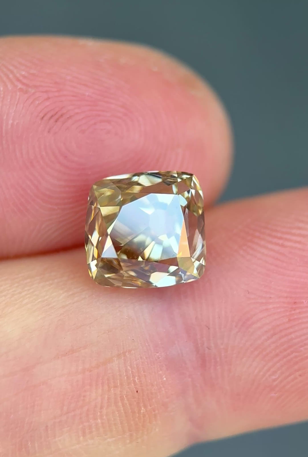 antique-cushion-champagne-diamond-natural-light-video