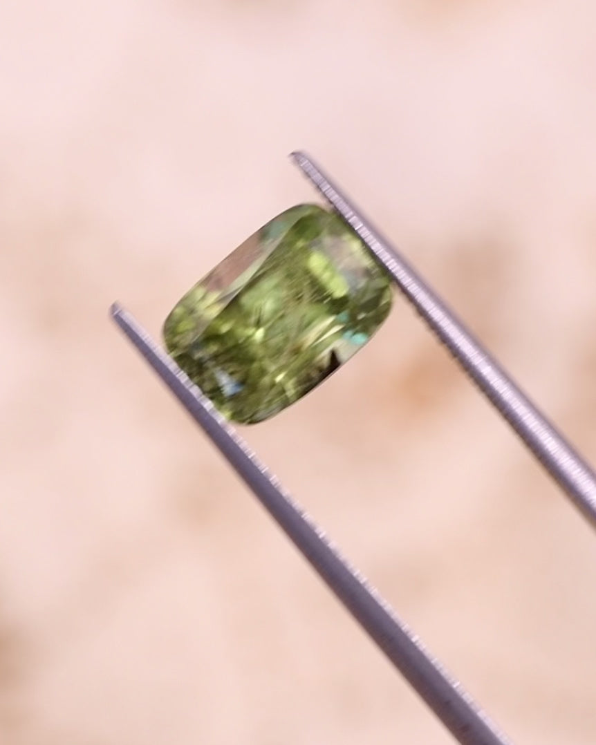 3.76CT Peridot: Green Black Cushion Mix Cut