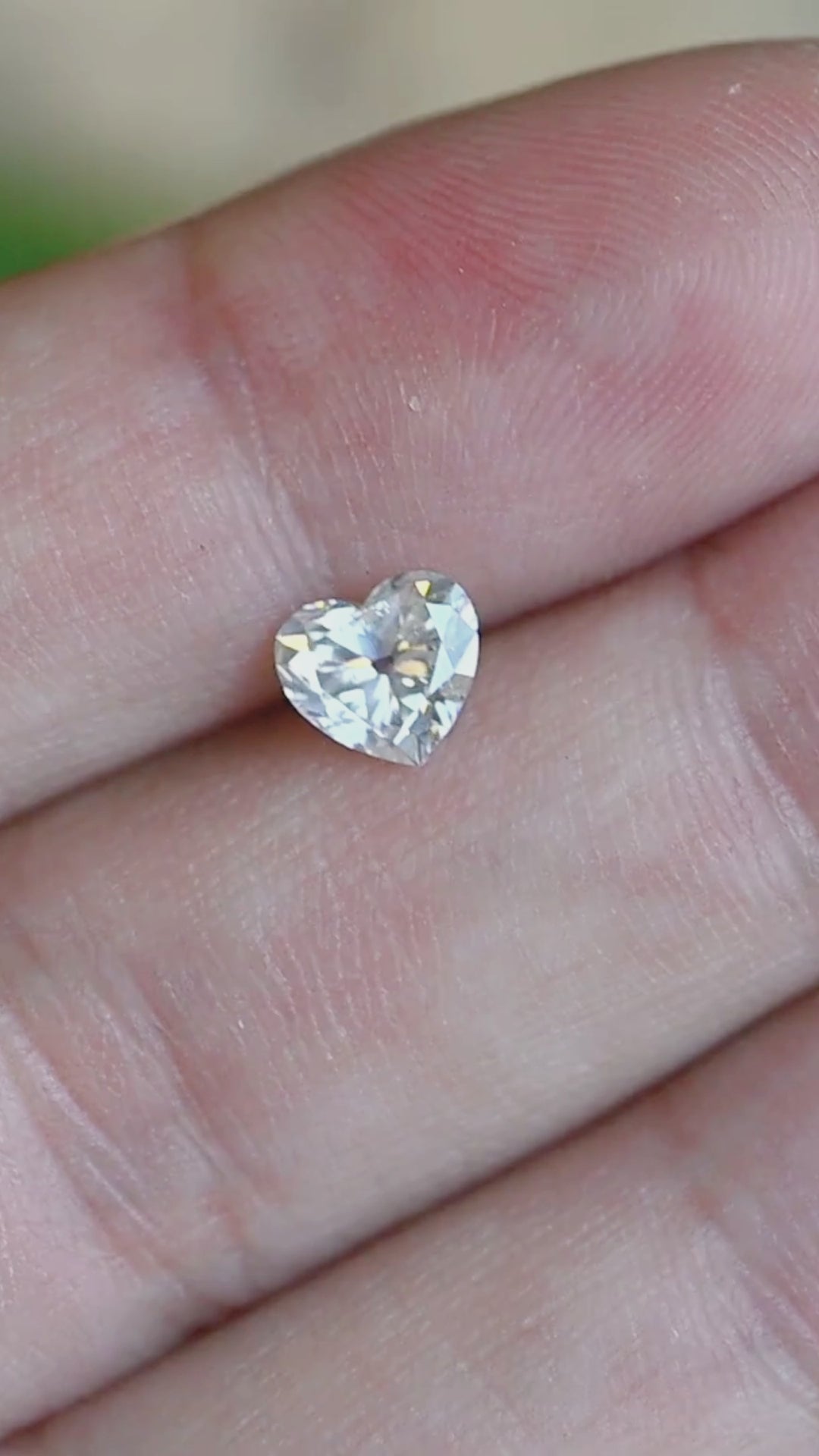 Experience the timeless beauty of this untreated 0.87 carat white diamond from South Africa. Its antique style heart cut produces elegant broad flashes of brilliance, making it a beautiful choice for a custom engagement ring, pendant, or heirloom jewelry design.