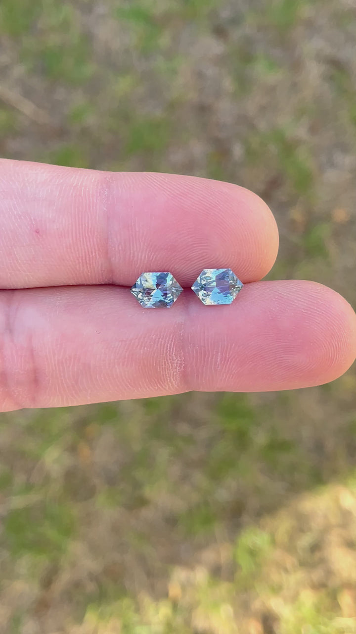 A 360-degree video showcasing the brilliance of a 3.15-carat sapphire in a mixed brilliant hexagon cut. The seafoam and blue tones shimmer beautifully, enhanced by heat treatment.