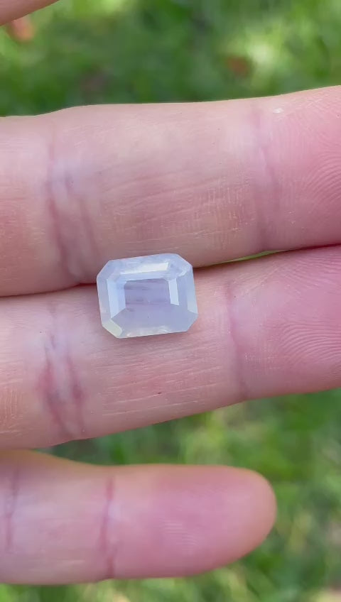 Detailed video capturing the stunning facets and color depth of a 5.10-carat opalescent sapphire, demonstrating its high-quality octagonal cut and natural origin from Sri Lanka.