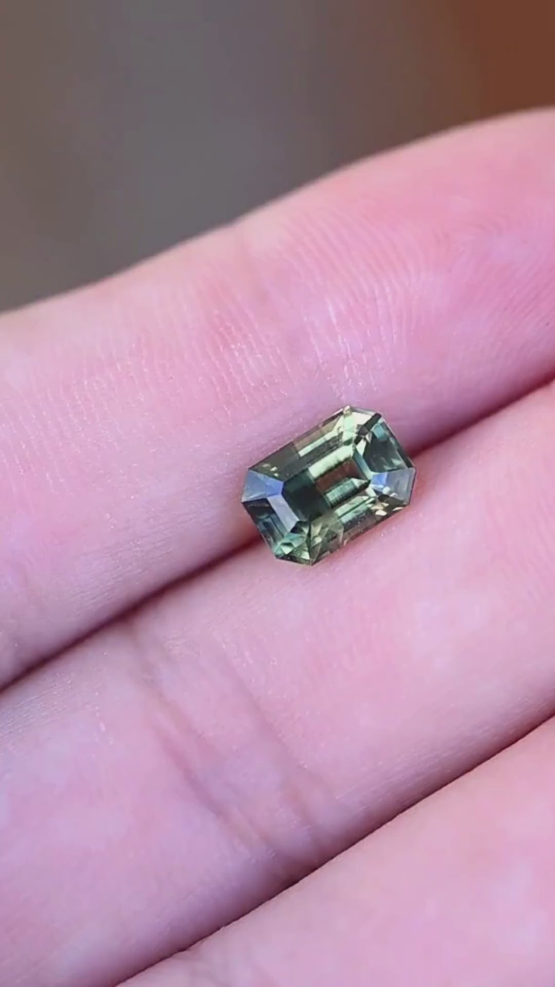 Explore the color and scale of this untreated 2.16ct Madagascar parti sapphire. Featuring yellow, teal green and blue tones, the precision octagonal step cut offers a distinctive geometric profile for custom jewelry.