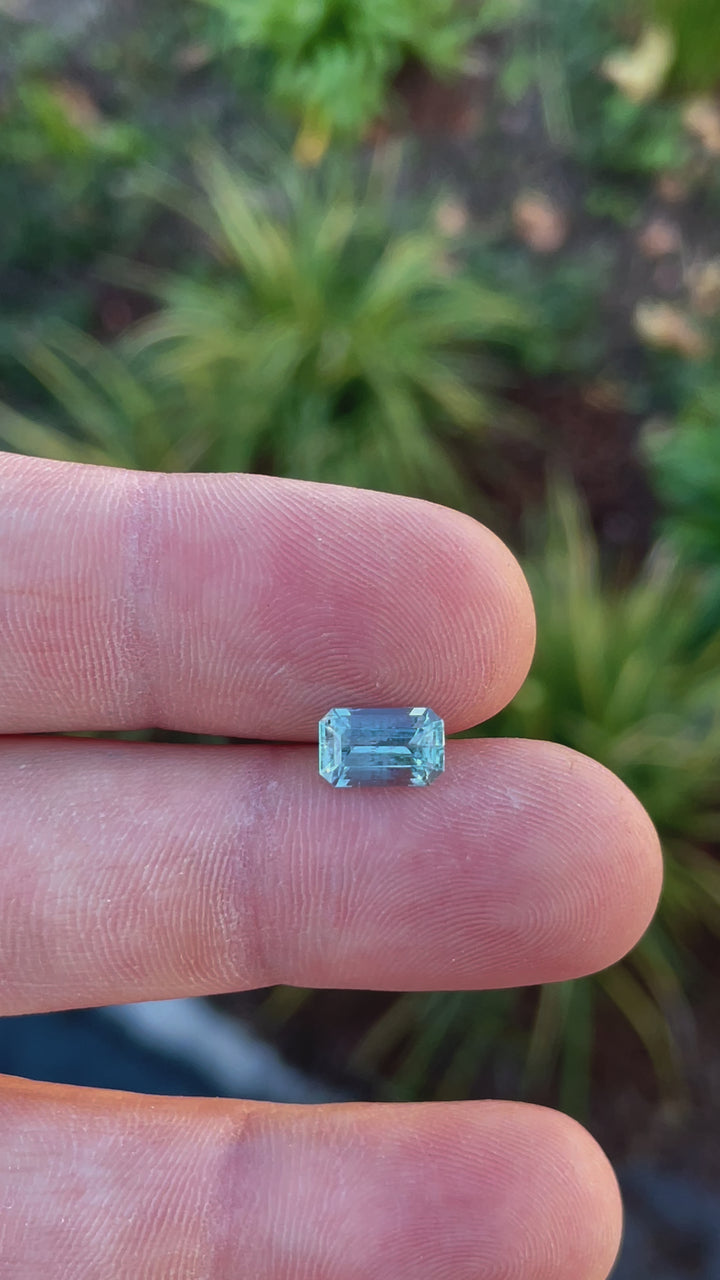 360-degree view of a 1.84-carat seafoam blue emerald-cut aquamarine gemstone, highlighting its vibrant color and exquisite cut from Mount Antero, Colorado.