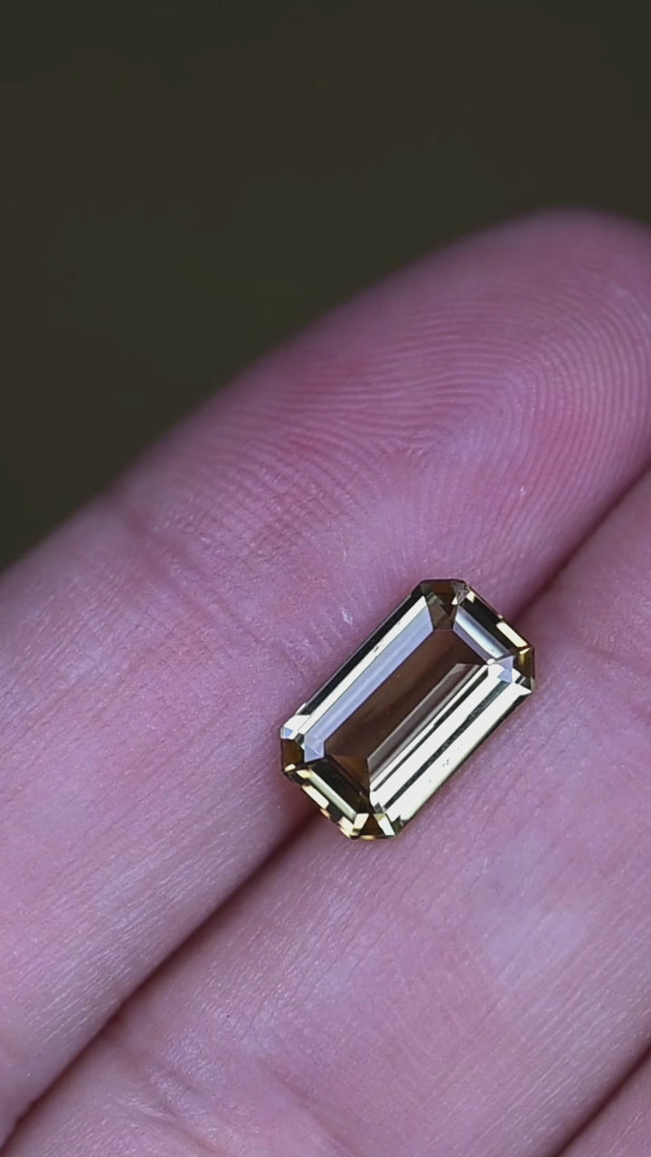 Experience the elegant reflections and rare natural color of this untreated Merelani tanzanite as its precision cut showcases exceptional clarity and architectural symmetry.