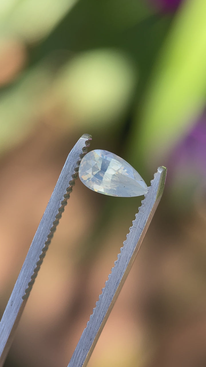 Precision   video View – Peach Sapphire in Tweezers (1.18ct)