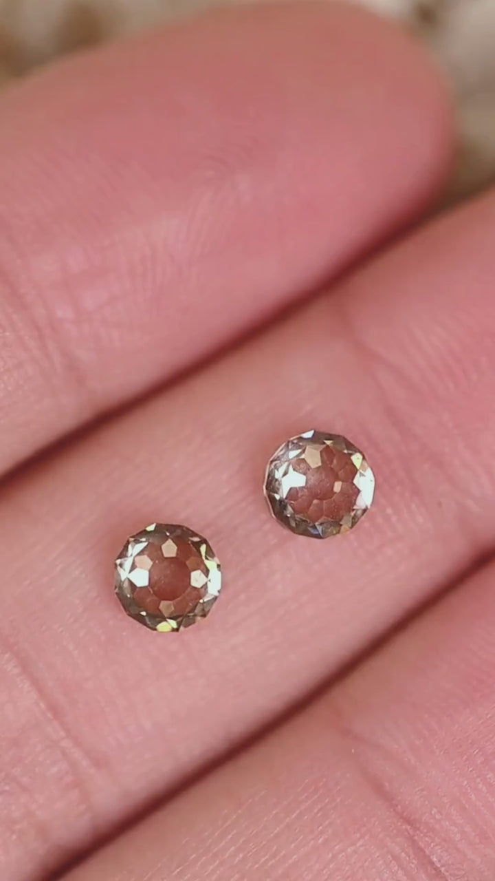 Explore this matched pair of C3 champagne diamonds from South Africa, weighing 1.41 carats total. Their Round Mughal cuts feature distinctive geometric faceting and open central areas, offering a beautiful alternative to traditional brilliant cut diamonds. With VVS1 clarity and closely matched proportions, this pair is suited to bespoke earrings, custom fine jewelry, and heirloom designs.