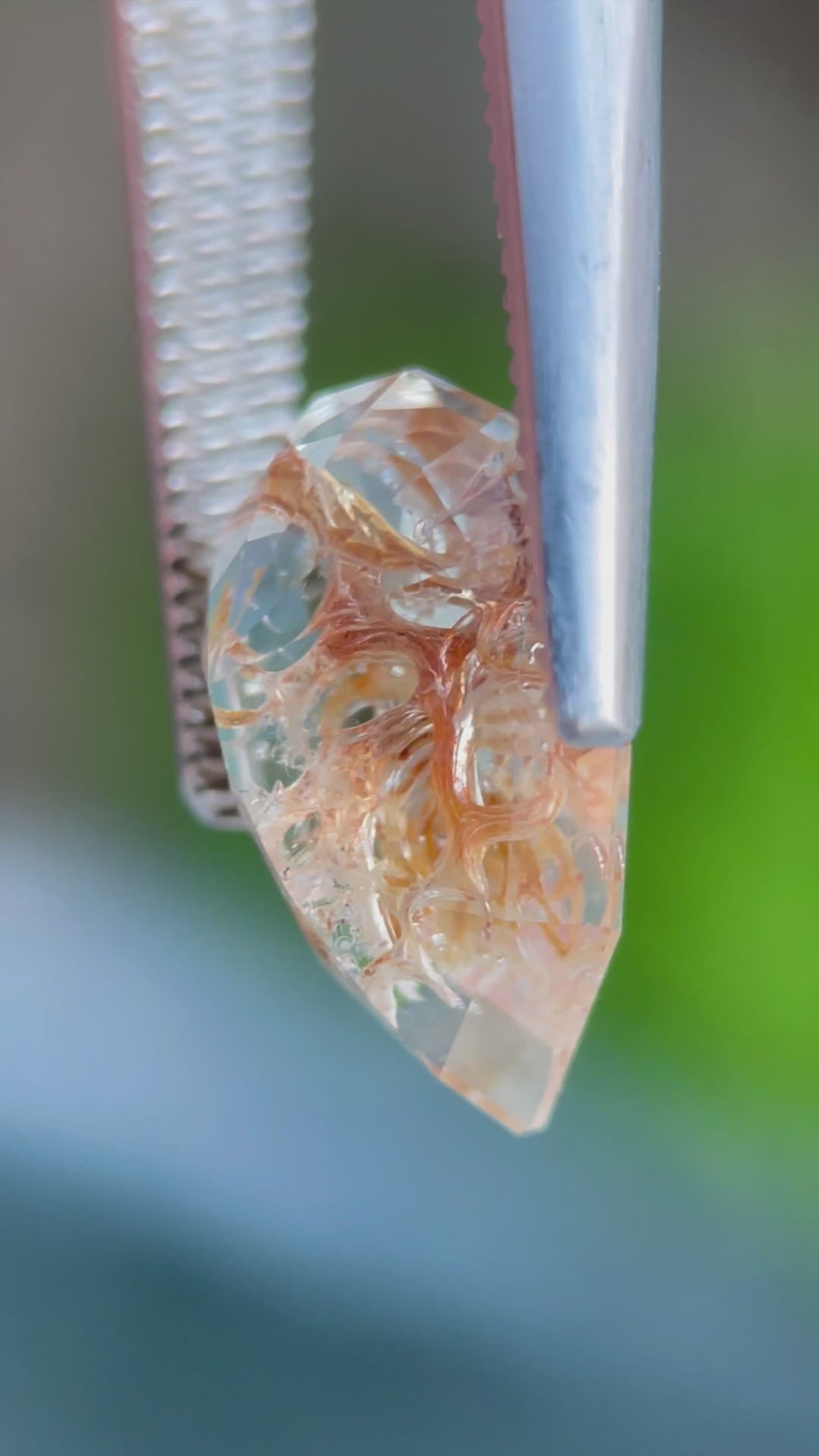 Watch the incredible transformation of this 4.18-carat Hyalite Opal as it glows under UV light. The opal shifts from clear and white to vibrant green fluorescence, highlighting its rare natural phenomenon.