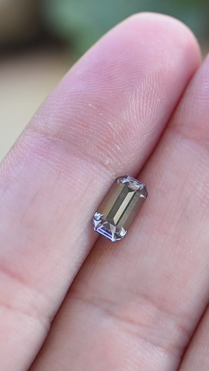 Experience the graceful step-facet reflections of this untreated 1.22 carat Merelani tanzanite as soft lavender, violet, and periwinkle tones shift with every movement.