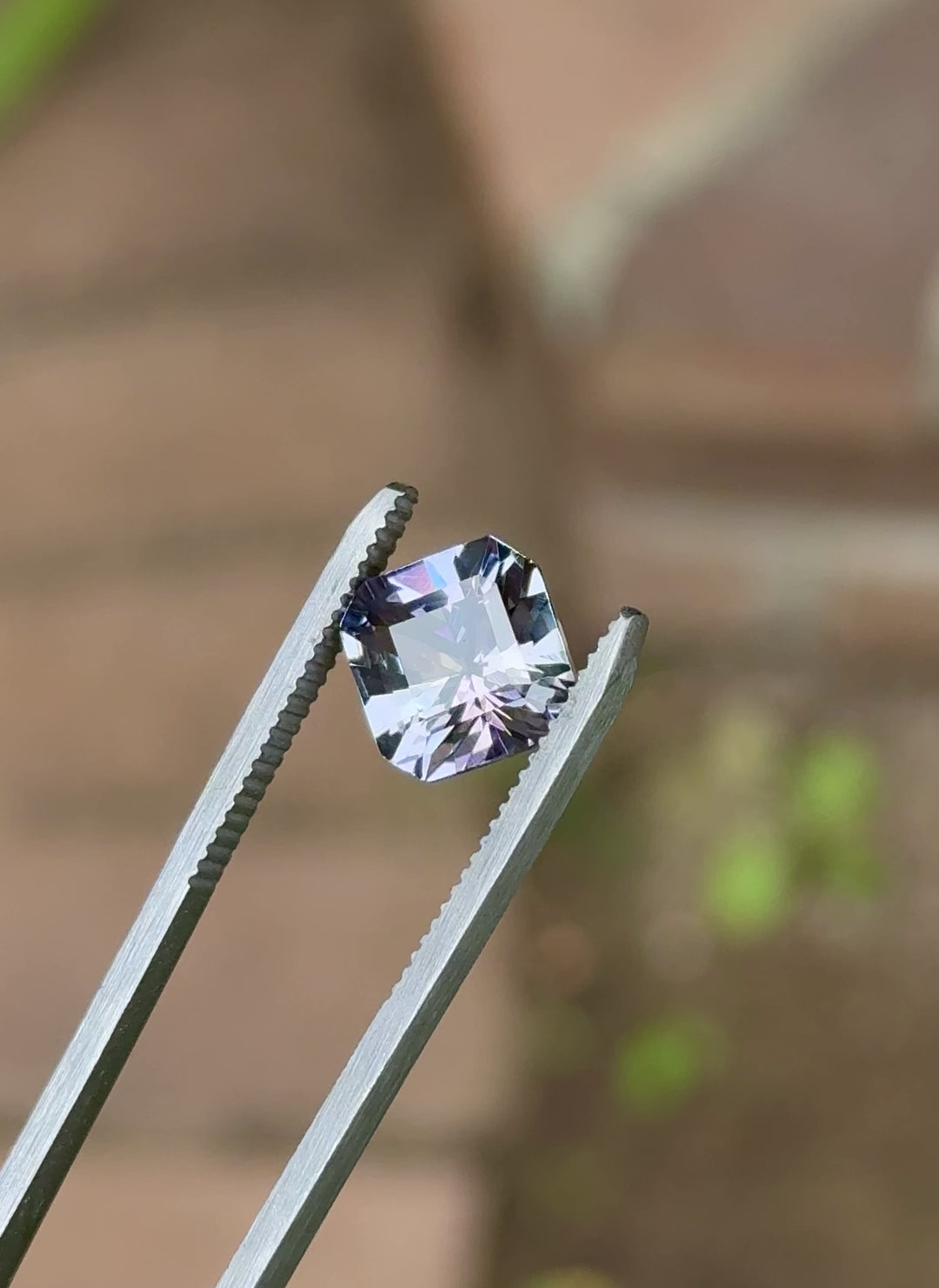 Close-up gem video of Merelani Hills Tanzanite, 4.59ct, revealing pink, lavender, and green brilliance